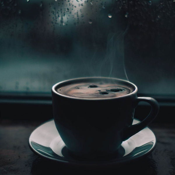 a cup of coffee sitting on top of a saucer