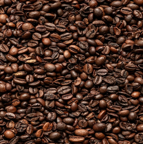 Full frame of dark roasted coffee beans.
