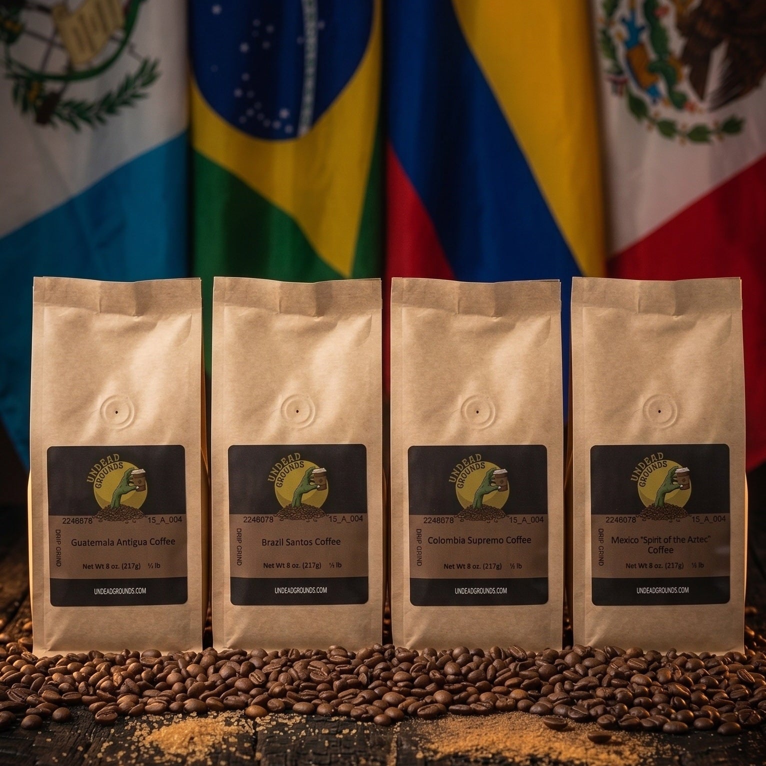 Four coffee bags with a label in front of three flags on a wooden surface.